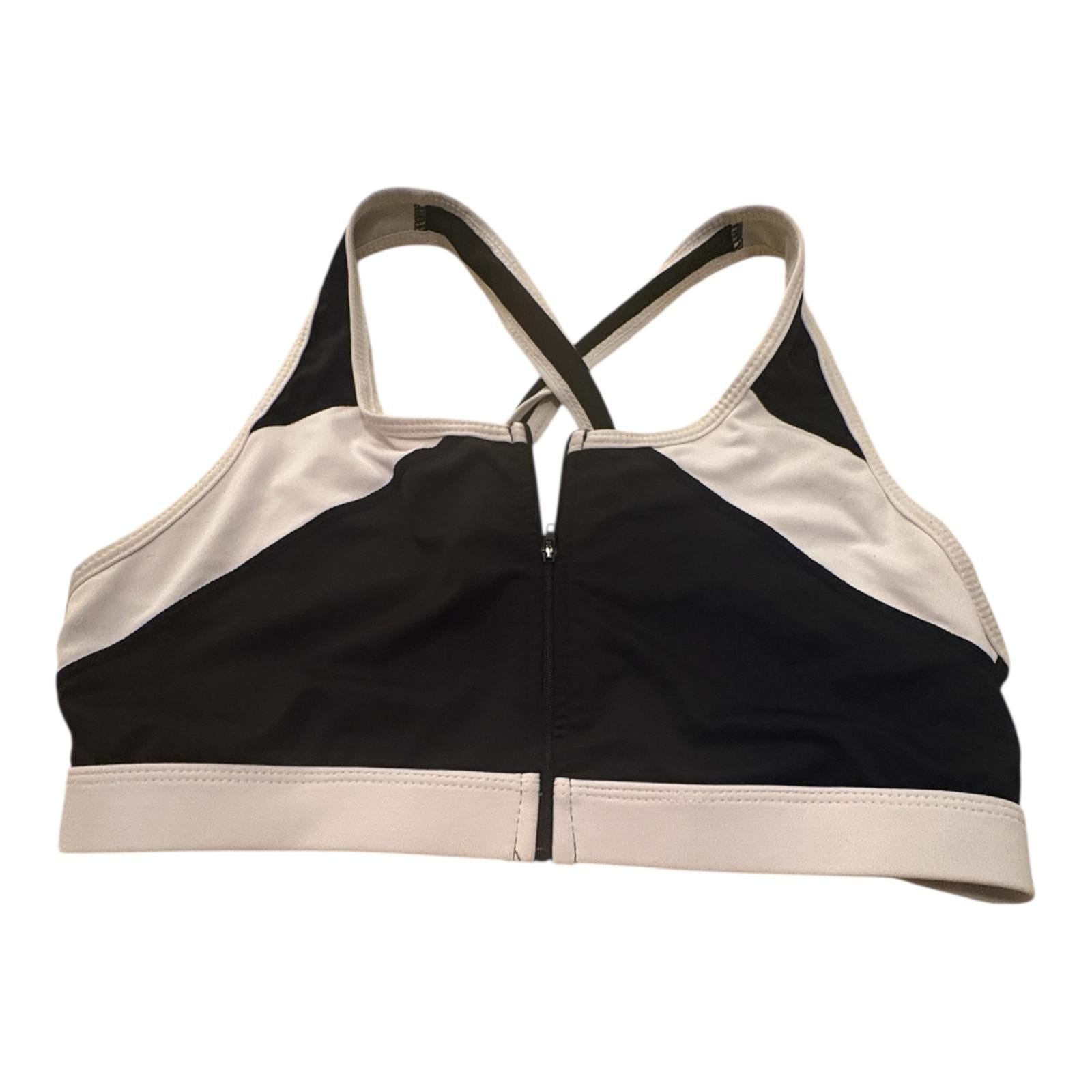 Top deportivo con cremallera blanco y negro talla L 5.99€
